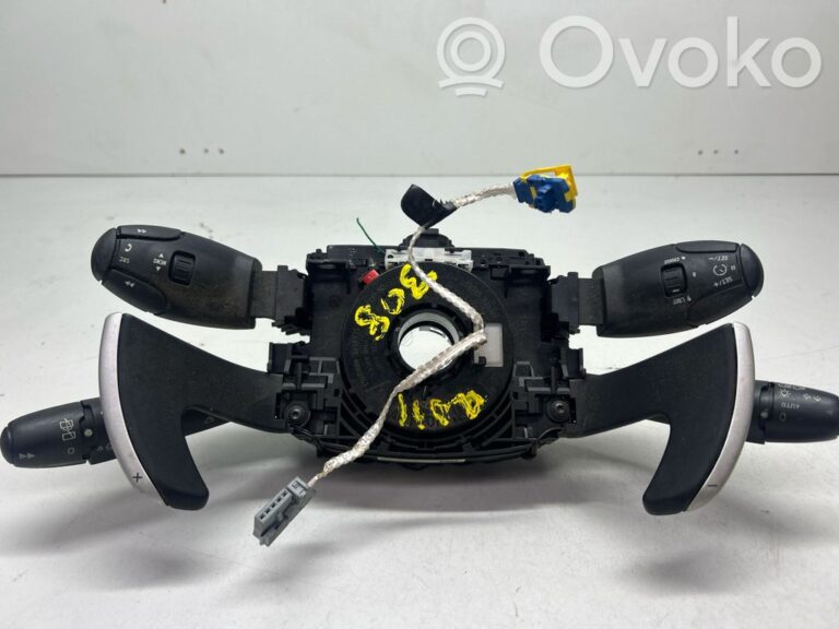 f9219ee082050e1d7a4696ee2f925f6b-cda3e5067cb691688da088c336d46573_steering_wheel_buttons_switches