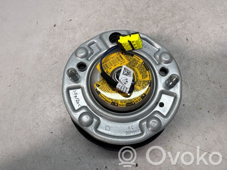 97b6f6a56934f48fc796d428ec9e67a6-a8765e3c95c613d4cb85291e7c5e0ec2_steering_wheel_airbag